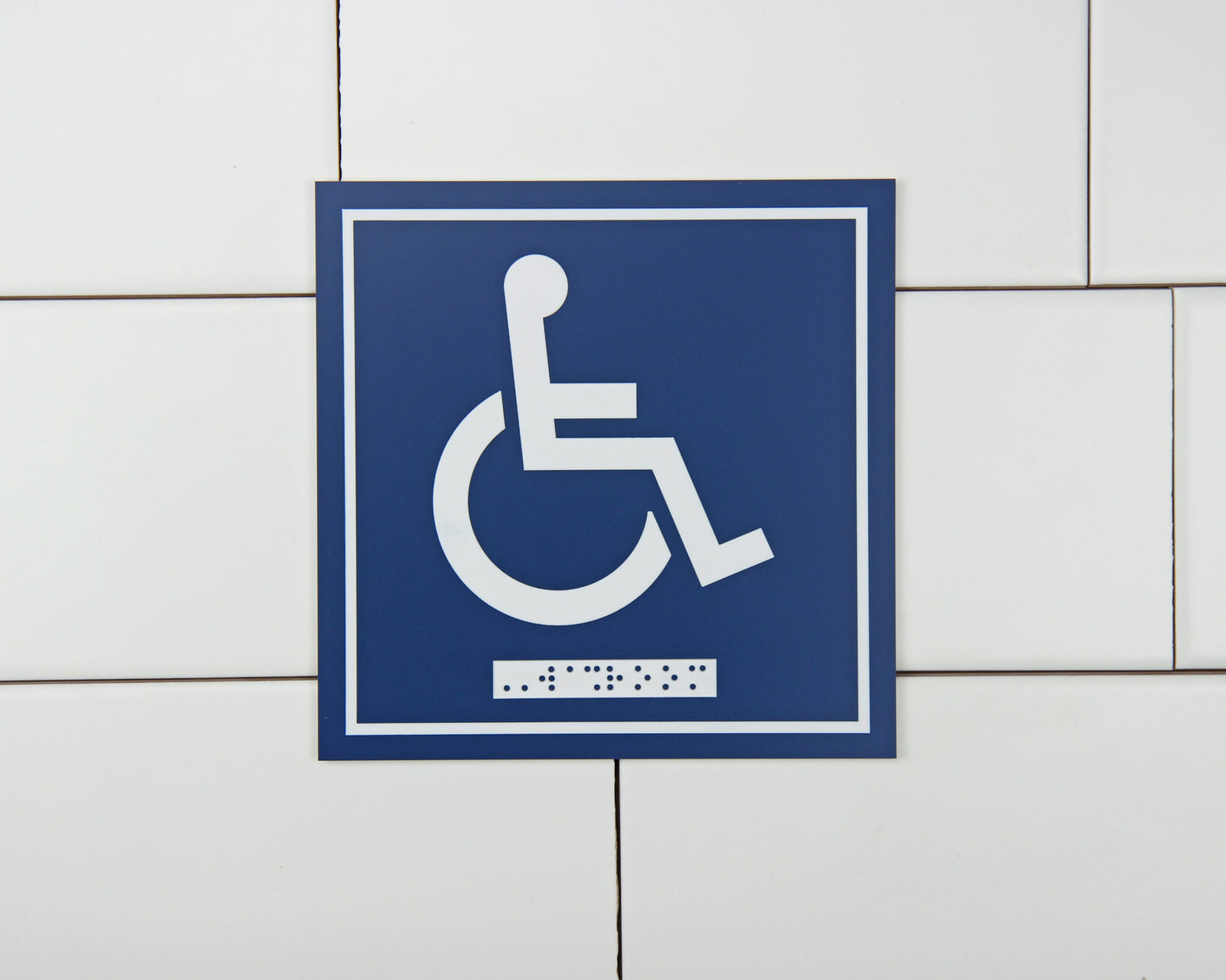 Frost Washroom Sign Wheelchair in use